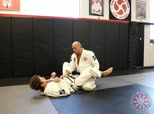 Triangle Defense with Knee on Butt